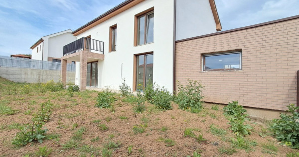 Casa cuplata prin garaj 23 mp, sup. totala 147 mp P+E in Chinteni