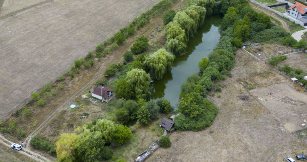 Teren de 7900 mp cu baltă de pescuit în Frumușeni