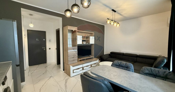 Apartament modern, cu curte și două locuri de parcare-b...