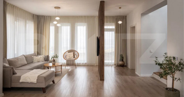 Casă modernă cu rafinament, lumină și eficiență energe