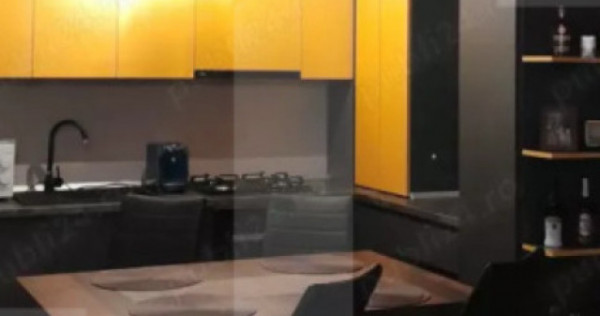 Apartament cu 2 camere, grădină proprie și loc de parcare