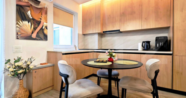 Apartament studio de vanzare + loc de parcare, Prima Onestil