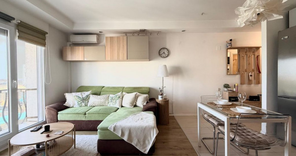 COSMOPOLIS - Apartament cu 2 camere, mobilat si utilat.