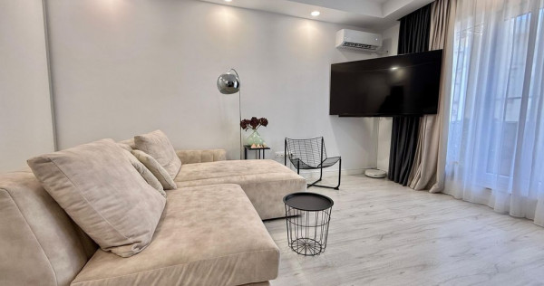 COSMOPOLIS - Apartament cu 2 camere, mobilat si utilat.