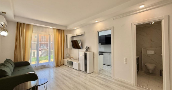 COSMOPOLIS - Apartament Tip studio cu 49 mp gradina,compl...
