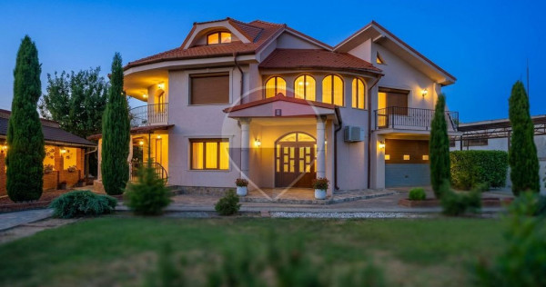 Vilă impunătoare și curte amplă cu parcare pentru mai multe mașini