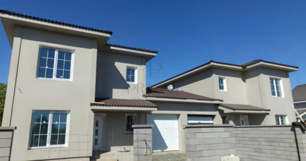 Duplex despartit prin garaj - teren 400 mp 5 camere -