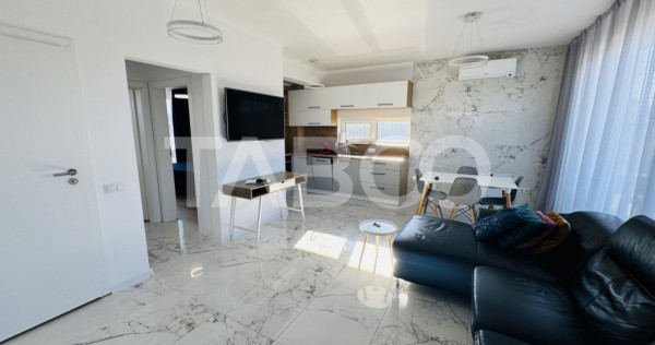 Penthouse cu terasa de 51mp de vanzare 3 camere 2 bai 1 par