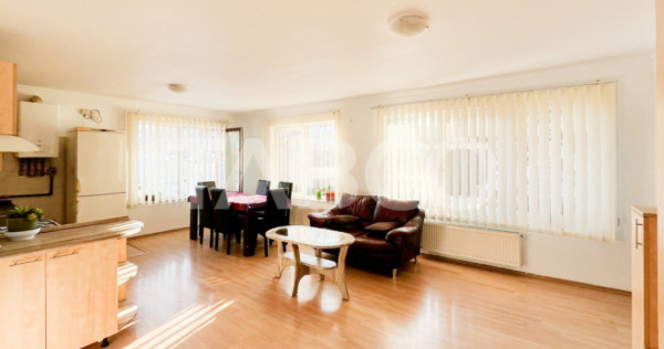Apartament cu 3 camere cu parcare de vanzare in cartierul Bu