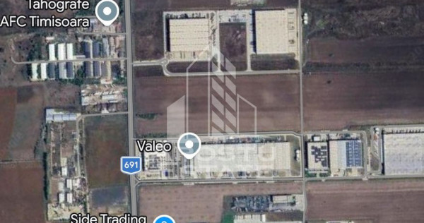Teren 2694 mp, cu front la șoseaua Dumbrăvița - Giarmata, la 4 benzi.