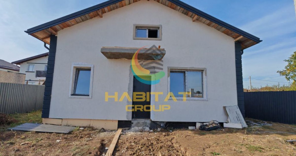 Casă individuală P+M cu scară suspendată din lemn și mansardă spațioasă &ndash; 118 mp