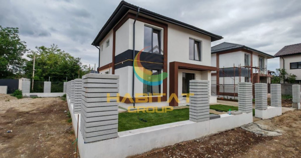 Casa moderna P plus 1 cu 4 camere si curte in ansamblu rezidential Berceni