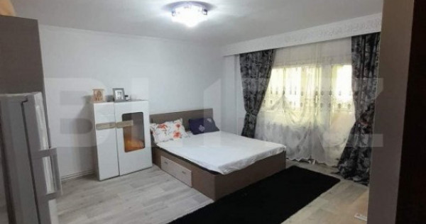 Apartament cu 3 camere, decomandat, parter,65 mp