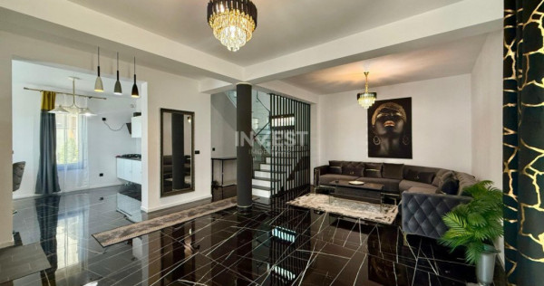 Vilă de vânzare cu design deosebit în cartierul Bucium
