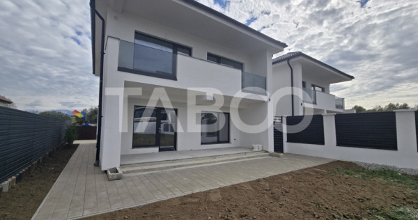 Casa de vanzare 380mp teren liber 4 camere 2 parcari Selimba