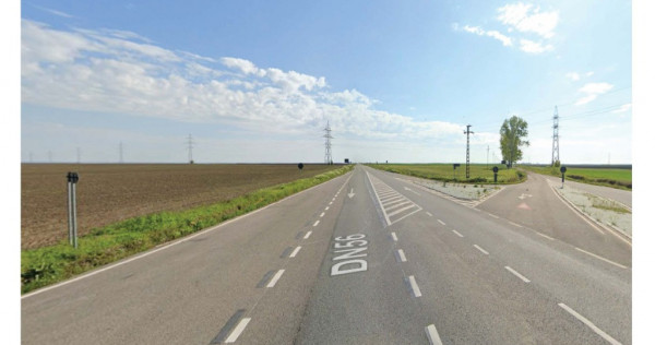 Teren cu posibilitati de investitii, pe drum european E79, 14300mp