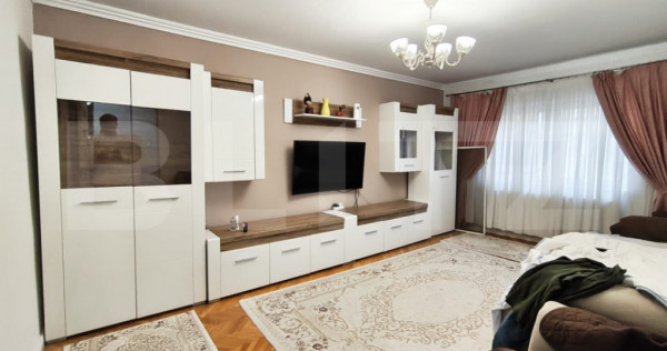 Apartament cu 3 camere, cu bucatarie extinsa si 2 bai, in Ro