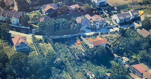 Teren de constructii intre case, in Medias cu utilitatile...