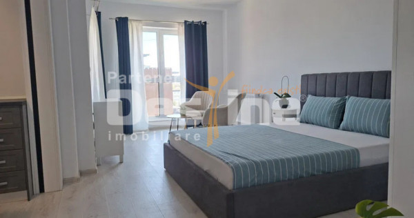 Garsoniera 49 mp, etaj intermediar, cu loc de parcare si ba