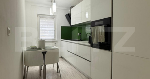 Apartament 3 camere, 2 bai, decomandat, etaj intermediar