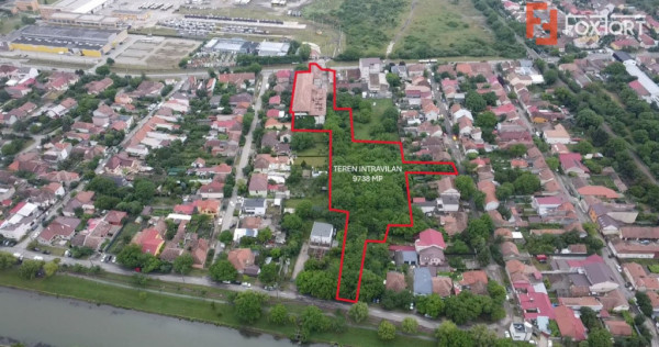 Teren intravilan 9738 mp, cu iesire pe 3 strazi - zona Dambo