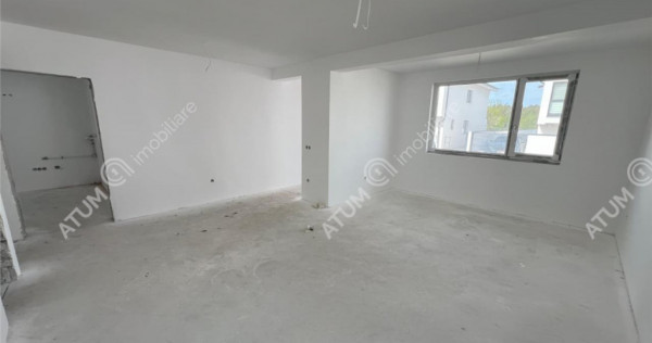 Casa cu 4 camere 2 bai curte de 50 mp zona Calea Cisnadiei S