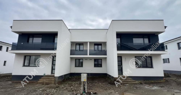 Casa cu 4 camere 2 bai curte de 50 mp zona Calea Cisnadiei S