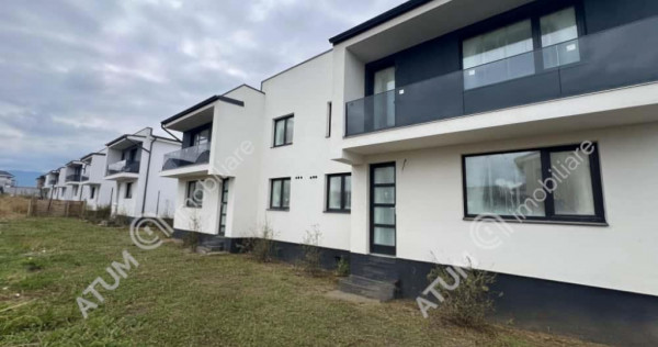 Casa cu 3 camere 2 bai si curte de 170 mp zona Calea Cisnadi