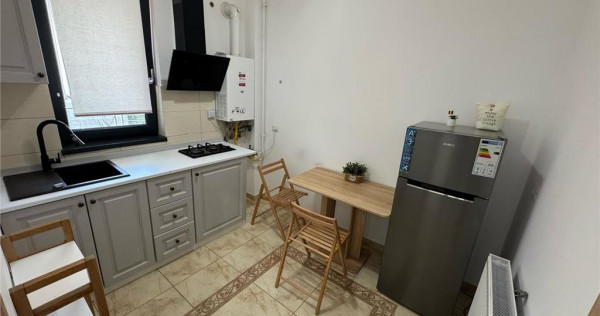 Garsoniera 45 mp utili, mobilata, parcare, et 1, bloc nou Cu