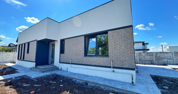 Casa individuală parter -- 4 camere - 2 băi - 110mp utili +teren 424mp