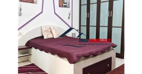 Garsoniera tip studio cu gradina de inchiriat