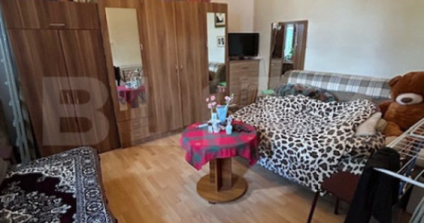 Apartament 2 camere + curte proprie și parcare – zona ext