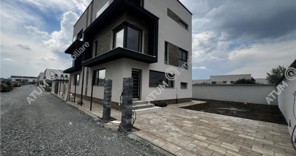 Casa intabulata cu 4 camere 3 bai si teren de 214 mp zona Tr