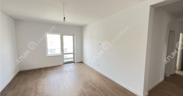 Apartament 2 camere balcon gradina si loc parcare zona Doamn