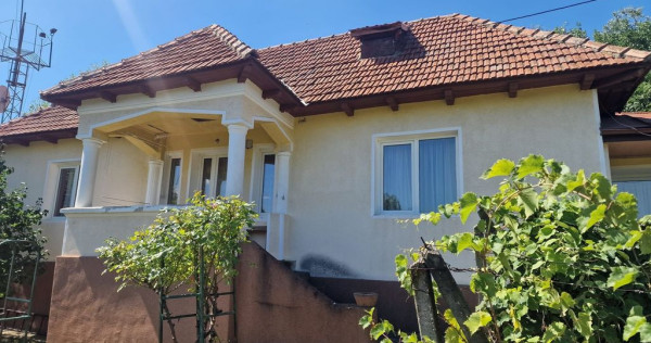 Casa in mediu rural cu teren