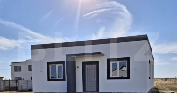 Casa pe parter în Cârcea, 103 mp utili, zona Metro, teren