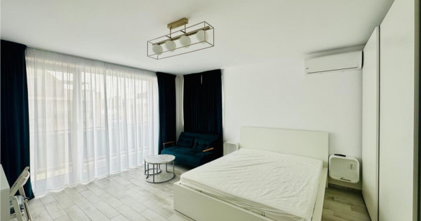 Decomandat cu loc de parcare, etaj intermediar, doua balcoan