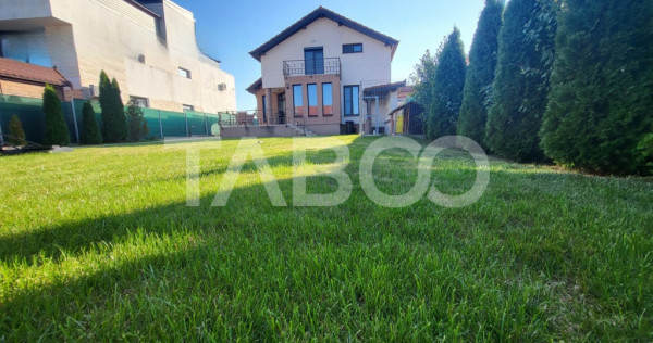 Casa individuala 5 camere 2 garaje 500 mp curte 2 terase in