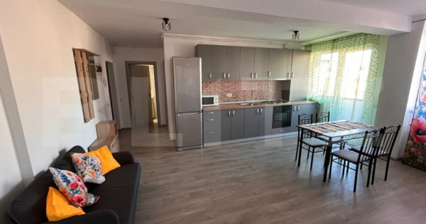 Apartament cu 3 camere, 55 mp, 2 bai, cu balcon si parcare,