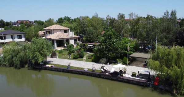 Imobil de lux pe malul lacului cu ponton, complet mobilat si utilat