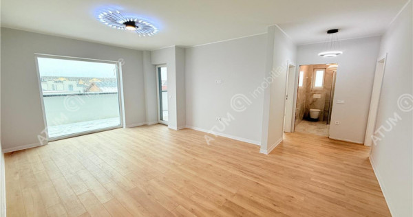 Apartament cu 3 camere terasa 40 mp 85 mp utili si 2 locuri