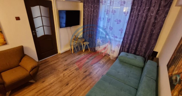 Garsonieră de &icirc;nchiriat Craiova centru, 24 mp, mobilată, aer condiționat