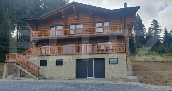 Cabana din bustean masiv si o suprafata de teren de 9000 mp