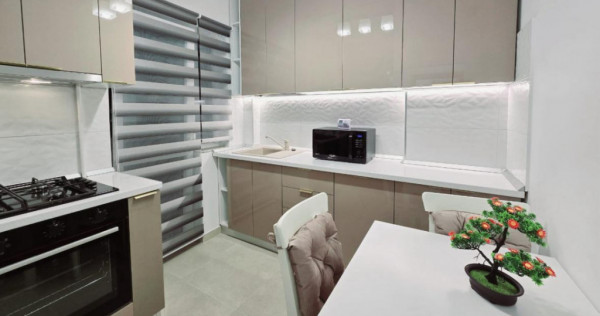 APARTAMENT RENOVAT CU LOC DE PARCARE SI CURTE