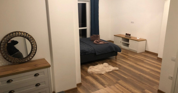 Apartament cu patru camere ,mobilat si utilat.