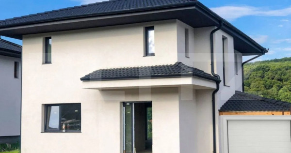 Casă individuală cu 5 camere, teren generos și garaj