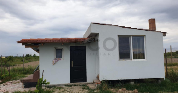 Teren intravilan cu cabana in Pausa