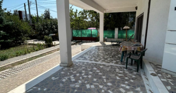 Povestea unei case la doar 200 m de valuri, cu piscină și