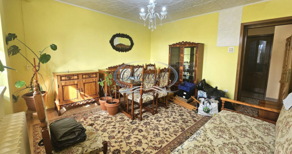 Apartament de vanzare cu balcon si centrala proprie in carti