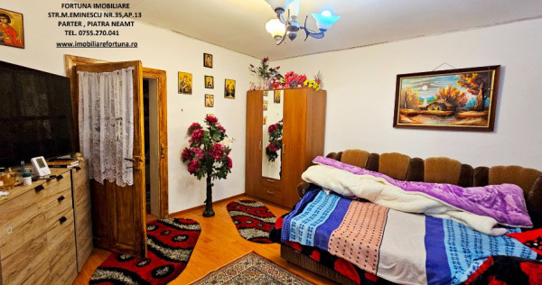 Casa individuala,2 beciuri mari,anexe,920 mp teren,la 10 min.de P.Nt.